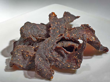 Do You Cook Meat Before Dehydrating? [The Science] – People's Choice Beef  Jerky